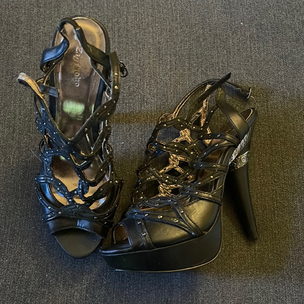 Edgy strapy heels